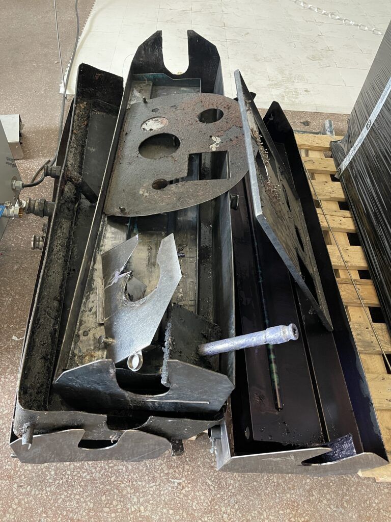 Ultrasonic cleaning of parts with graphic arts ink